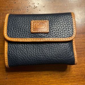 Dooney and Bourke pebble grain flap wallet.